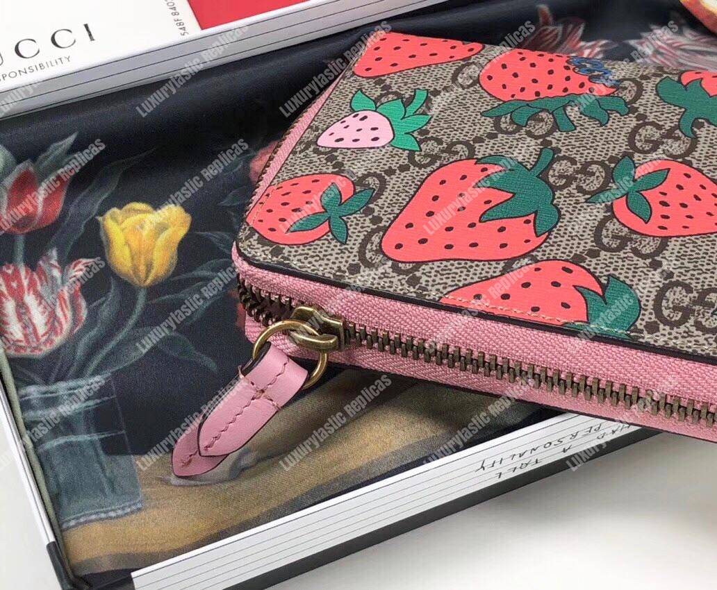 G*u*i gg wallet with G*u*i strawberry print