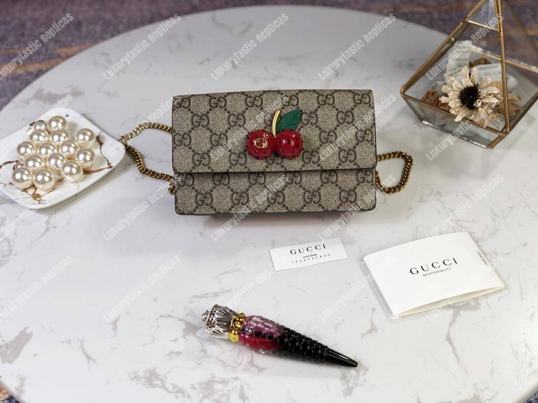 G*u*i gg sup*e mini bag with cherries