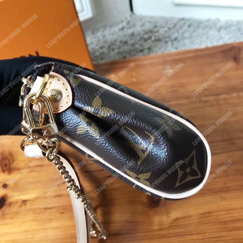 l**is V*t*n monogram canvas eva clutch