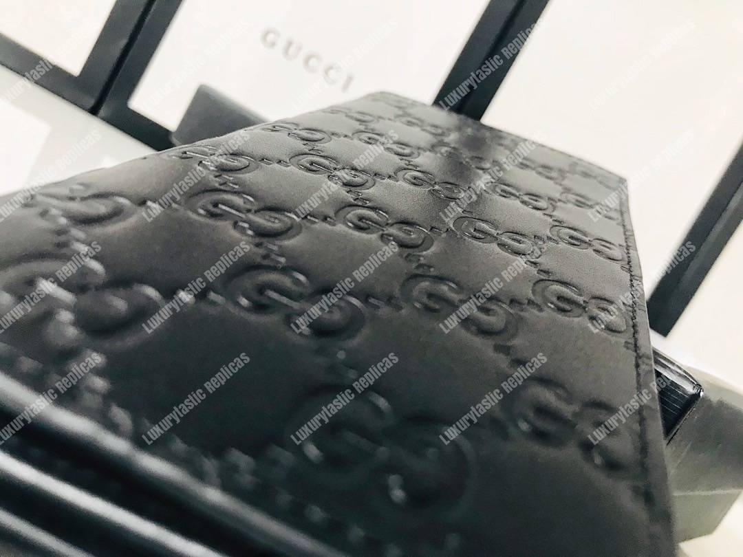 G*u*i signature long wallet with metal gg