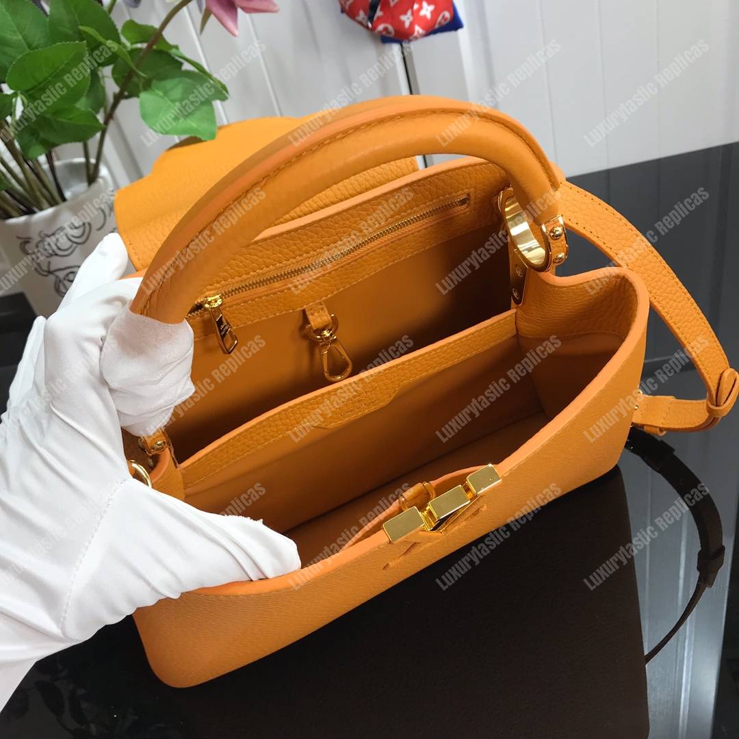 LV Capucines PM Taurillon Leather Ocre