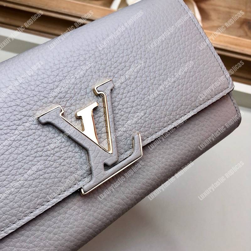 LV Capucines Wallet Taurillon Galet