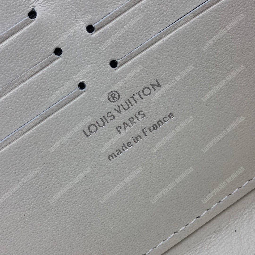 LV Zippy Wallet Mahina Leather Ivory