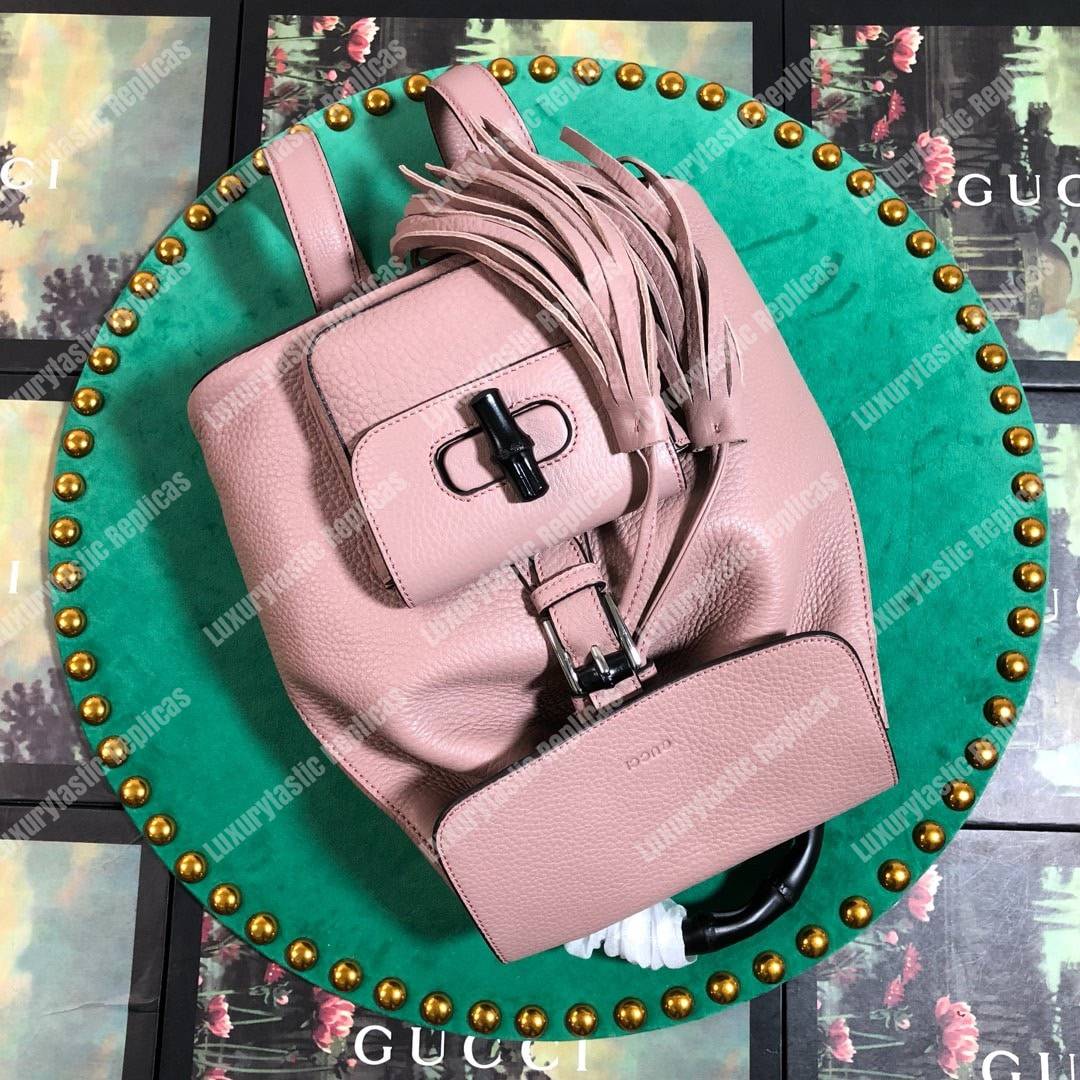 G*u*i leather bamboo tassel mini backpack magnolia