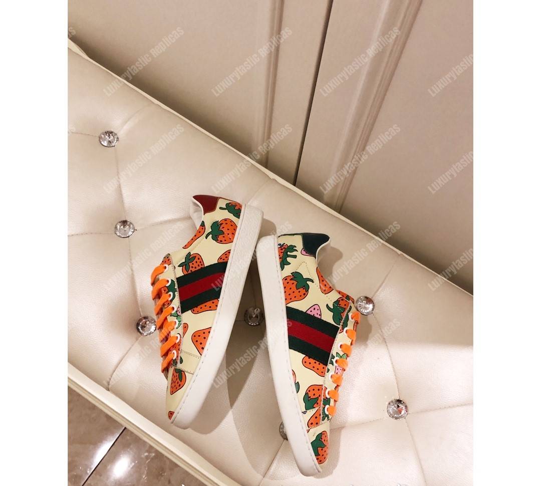 G*u*i ace sneaker with G*u*i strawberry print