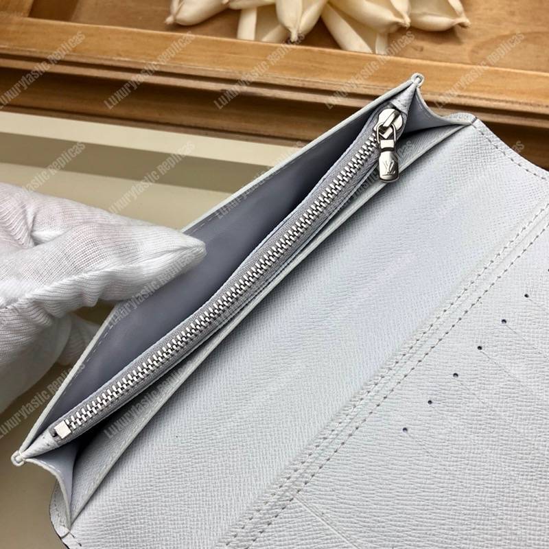 LV Brazza Wallet K45 Taiga Monogram Blanc