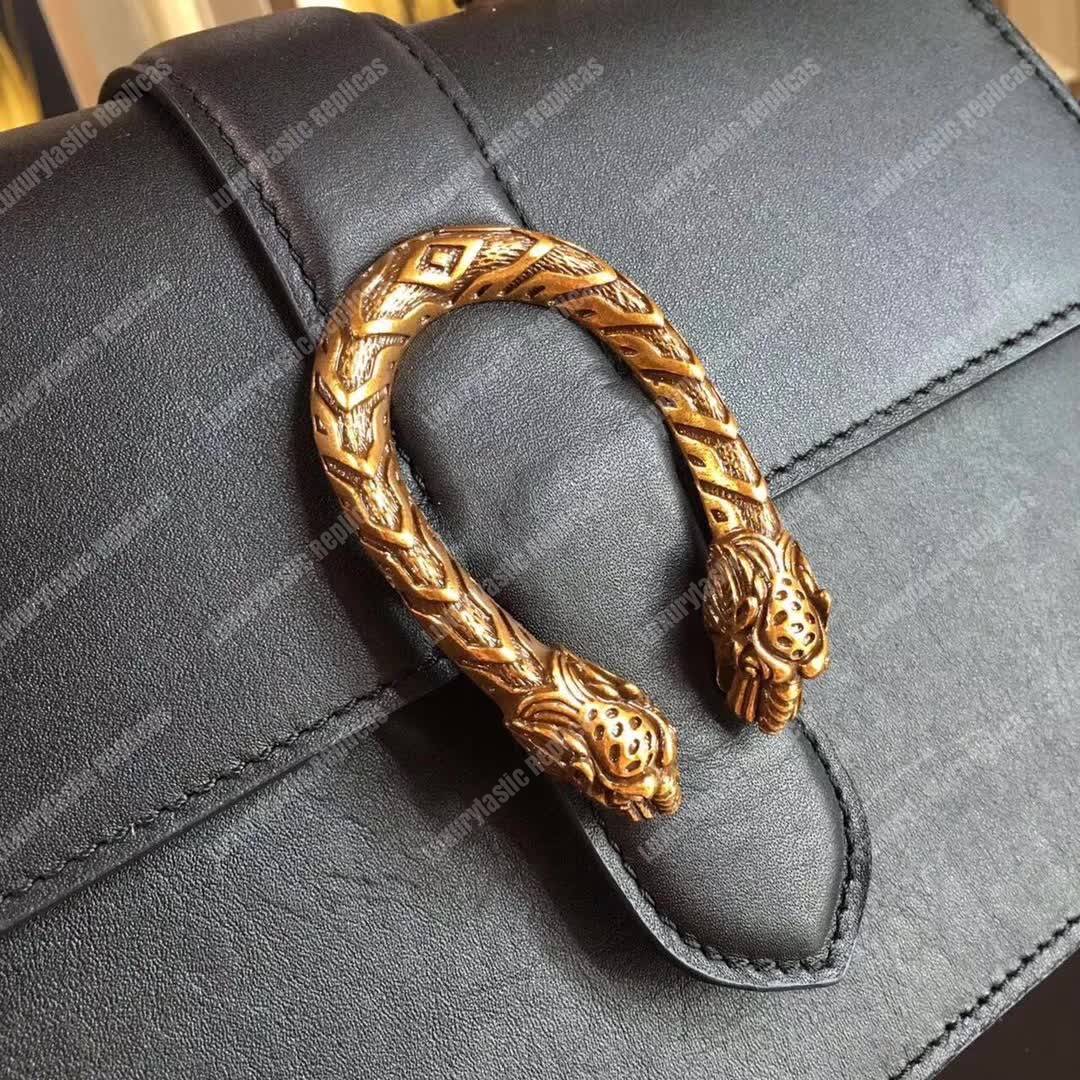 G*u*i dionysus medium top handle bag black