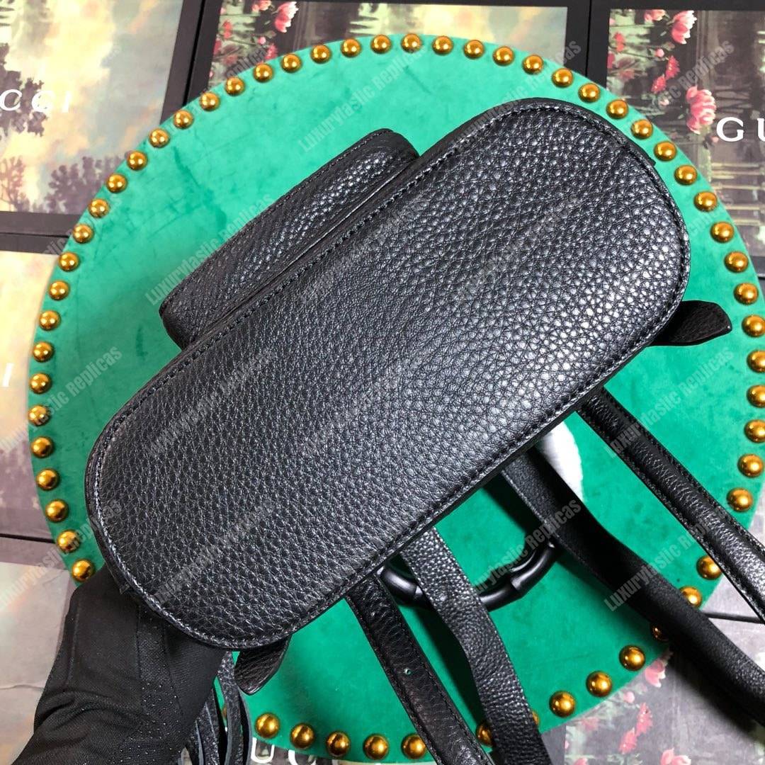 G*u*i leather bamboo tassel mini backpack black