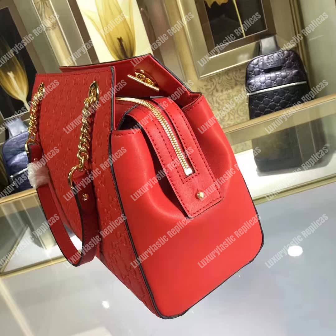 G*u*i signature medium top handle bag red
