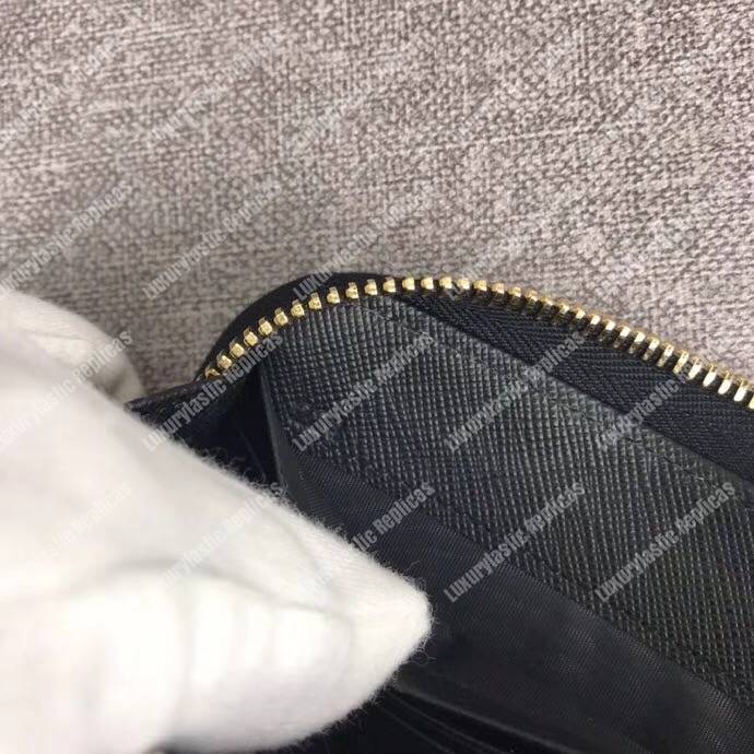 Pra*a large saffiano leather wallet black gold hardware
