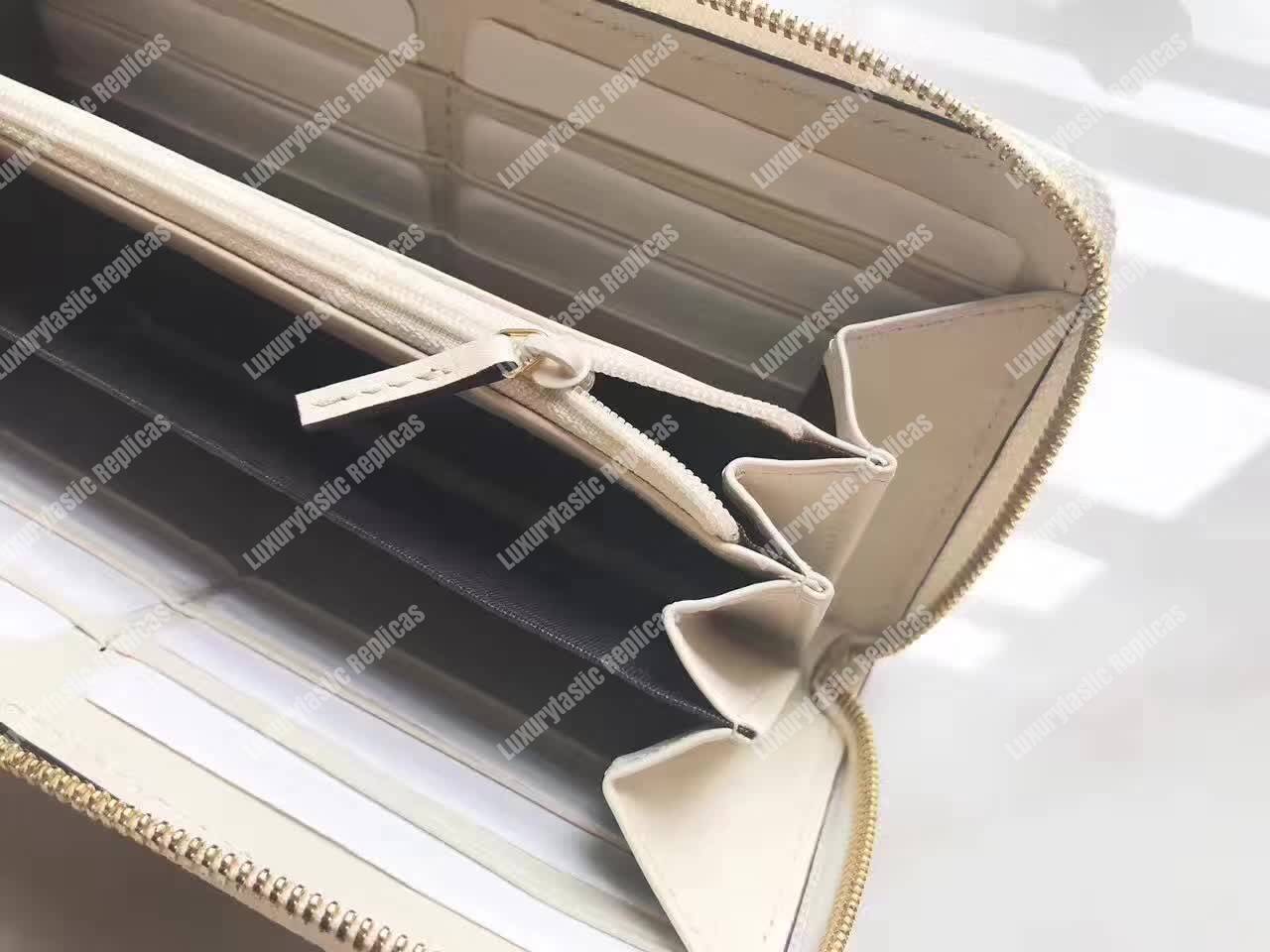 G*u*i sylvie leather zip around wallet white