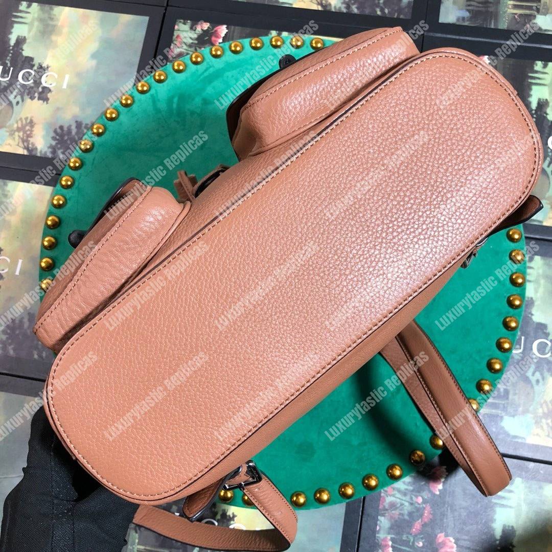 G*u*i leather bamboo tassel backpack light brown