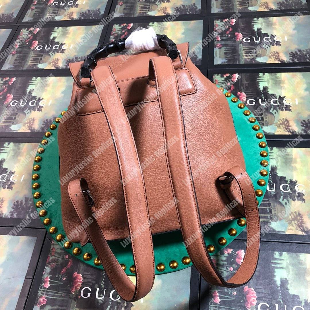 G*u*i leather bamboo tassel backpack light brown
