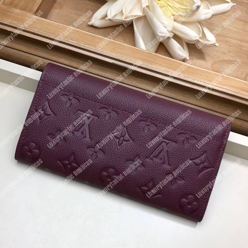 LV Sarah Wallet Monogram Empreinte Leather Raisin Purple
