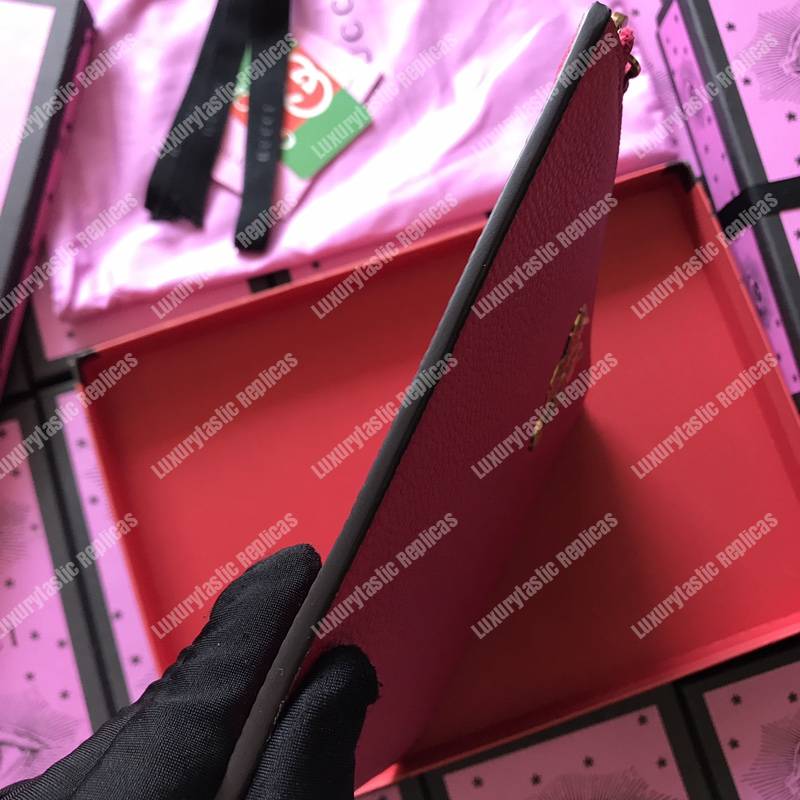 G*u*i leather pouch with butterfly red