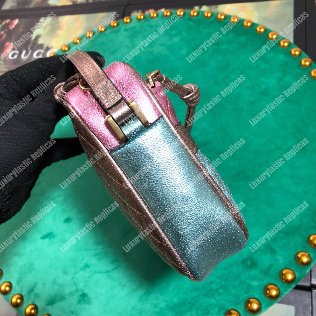 G*u*i zumi clutch metallic blue/pink