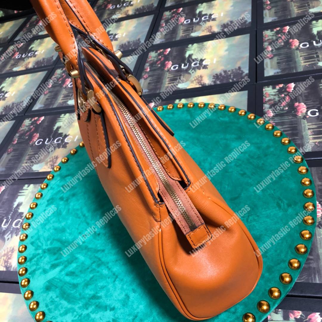 G*u*i re(belle) medium shoulder bag leather orange