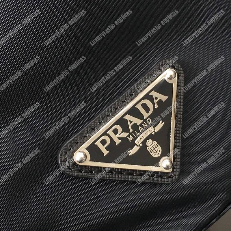 Pra*a black nylon backpack yellow