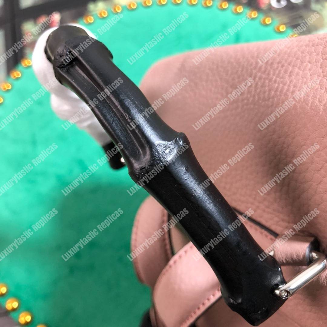 G*u*i leather bamboo tassel mini backpack magnolia