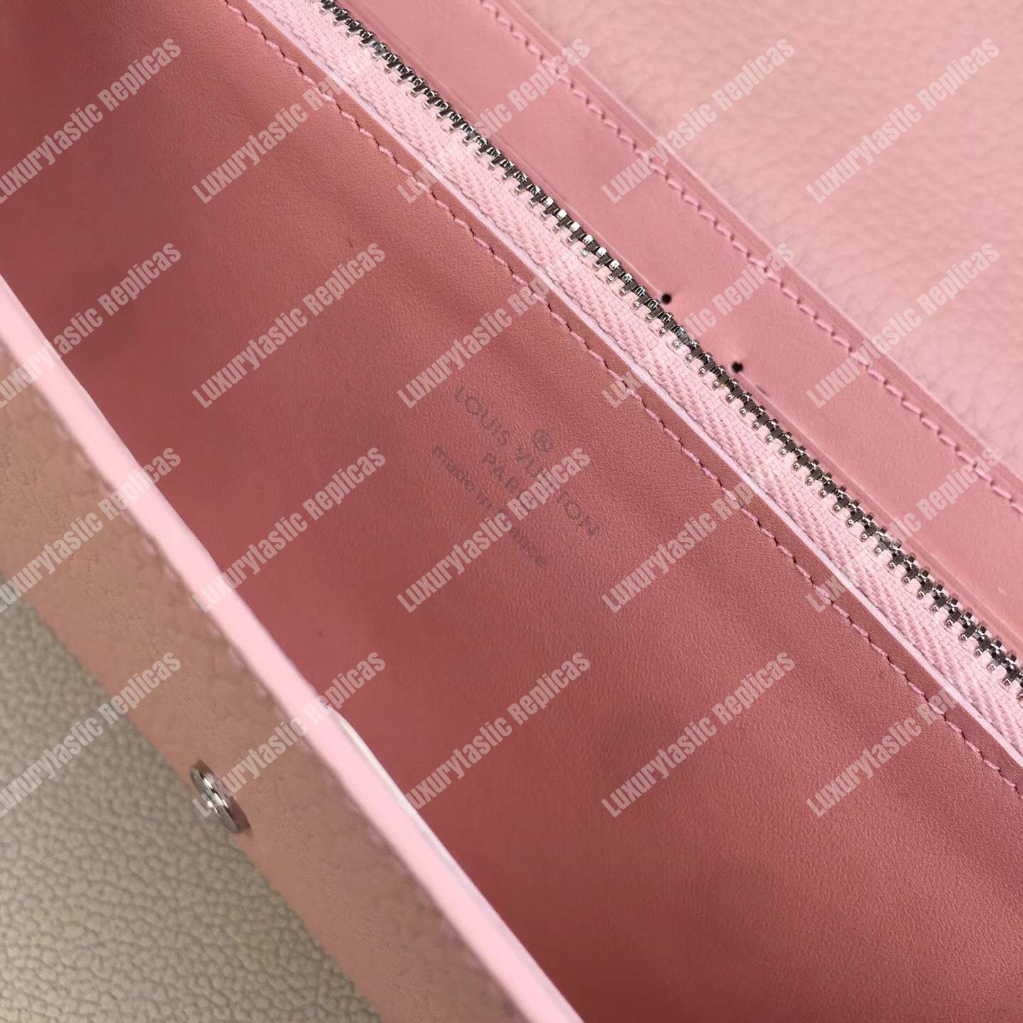 LV Capucines Wallet Magnolia