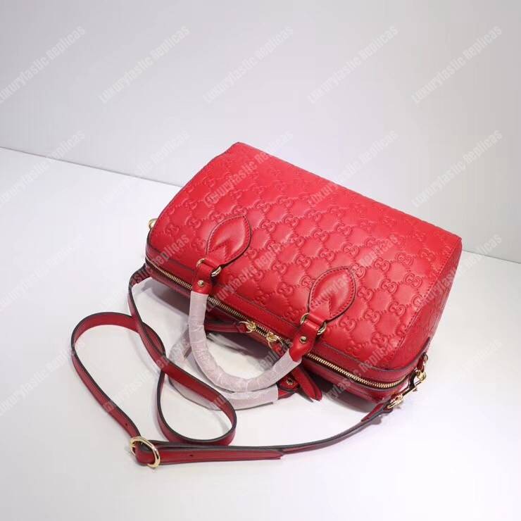 G*u*i signature medium top handle bag red