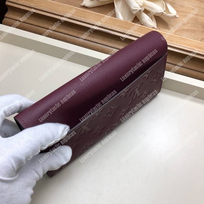 LV Sarah Wallet Monogram Empreinte Leather Raisin Purple