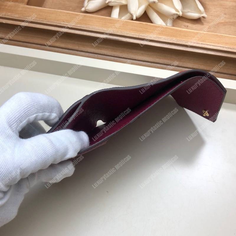 LV Zoé Wallet Monogram Fuchsia colored leather