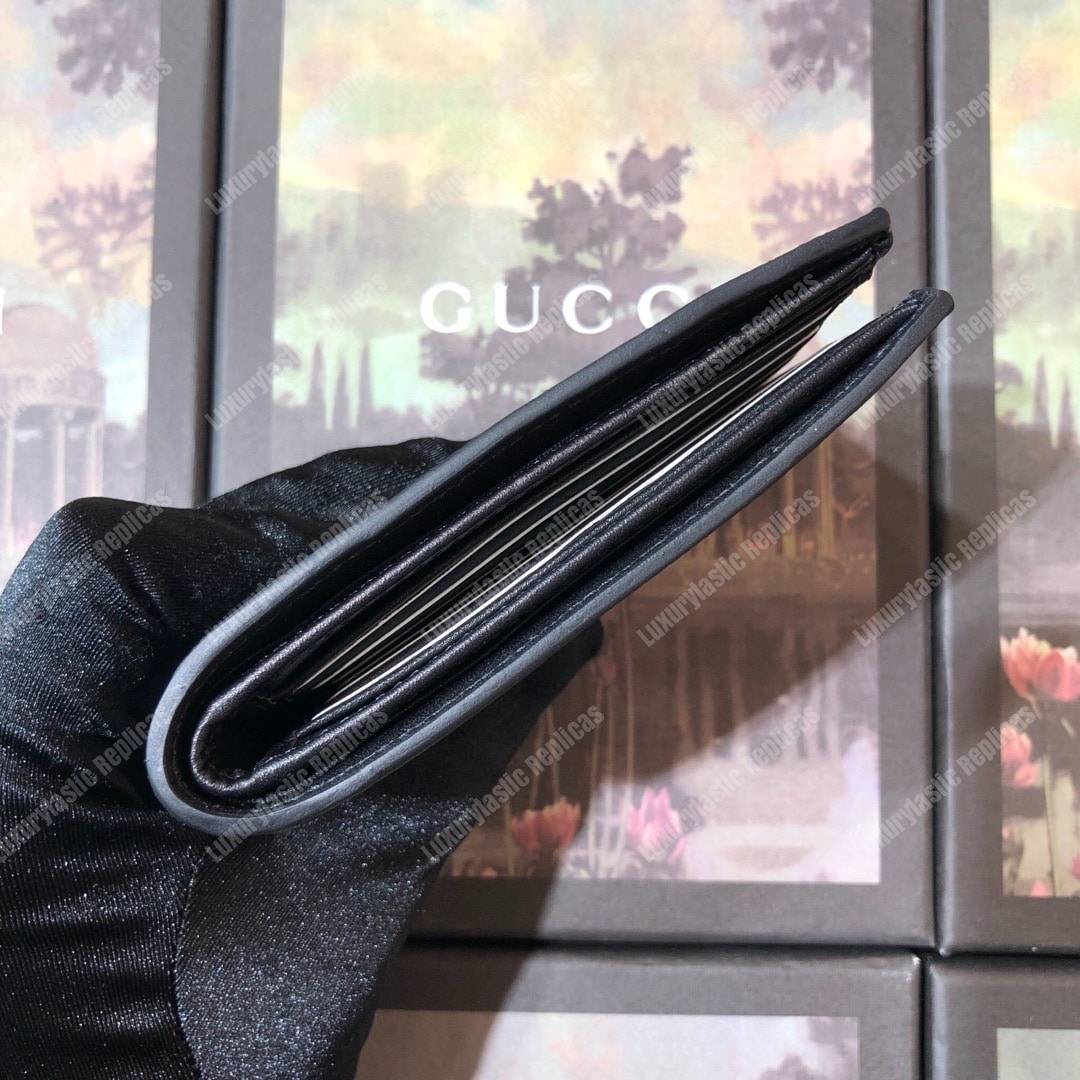 G*u*i gg sup*e wallet with wolf