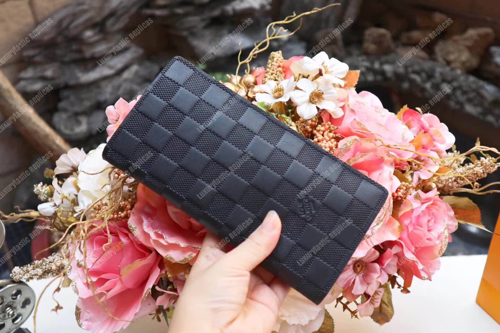 LV Brazza Wallet Vertical Damier Infini Leather Astral