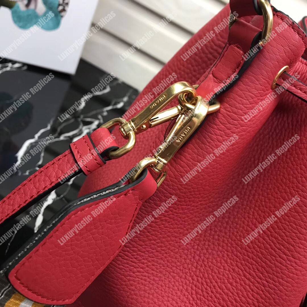 Pra*a leather bucket bag red