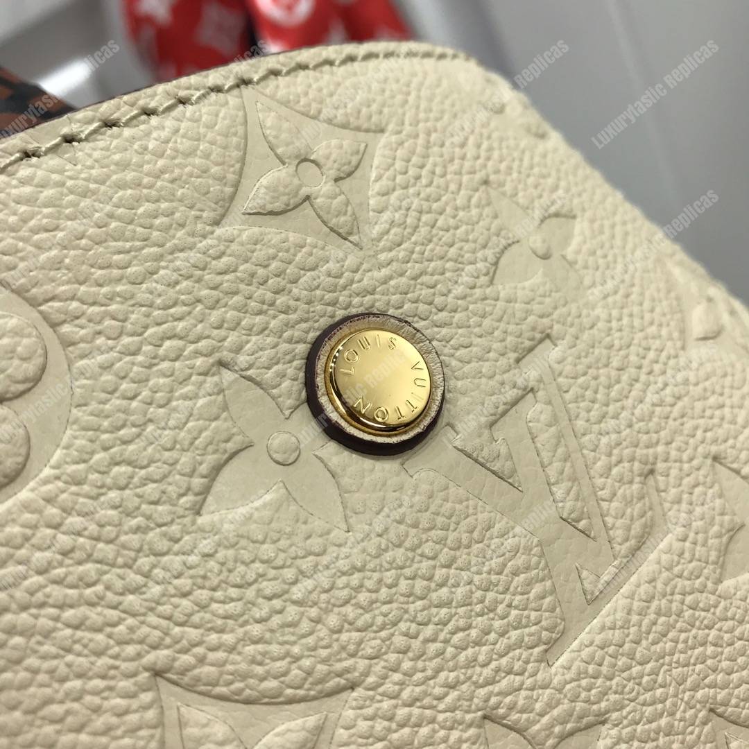 LV Montaigne MM Monogram Empreinte leather Creme