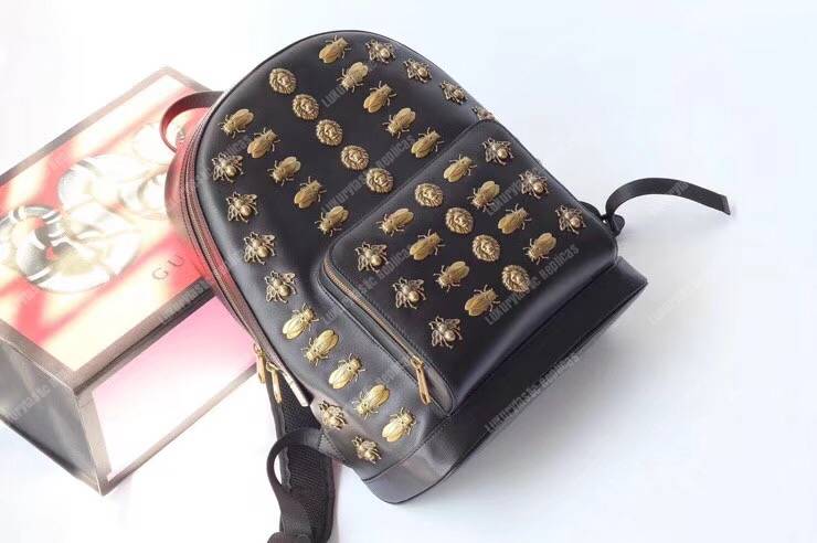 G*u*i animal studs leather backpack black