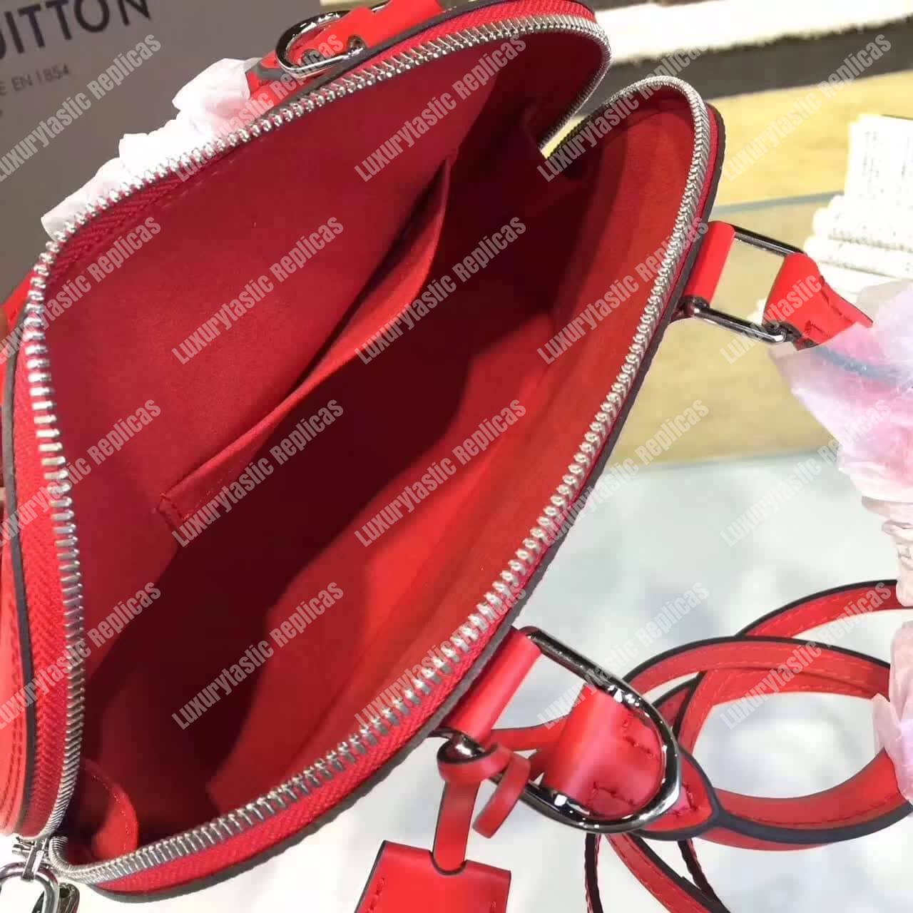 LV Alma BB Epi Leather Coquelicot