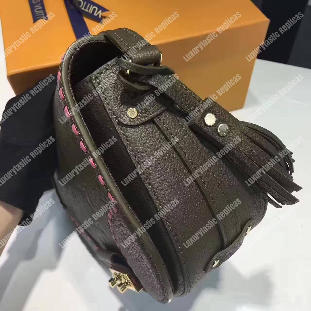 LV Junot Monogram Empreinte Leather