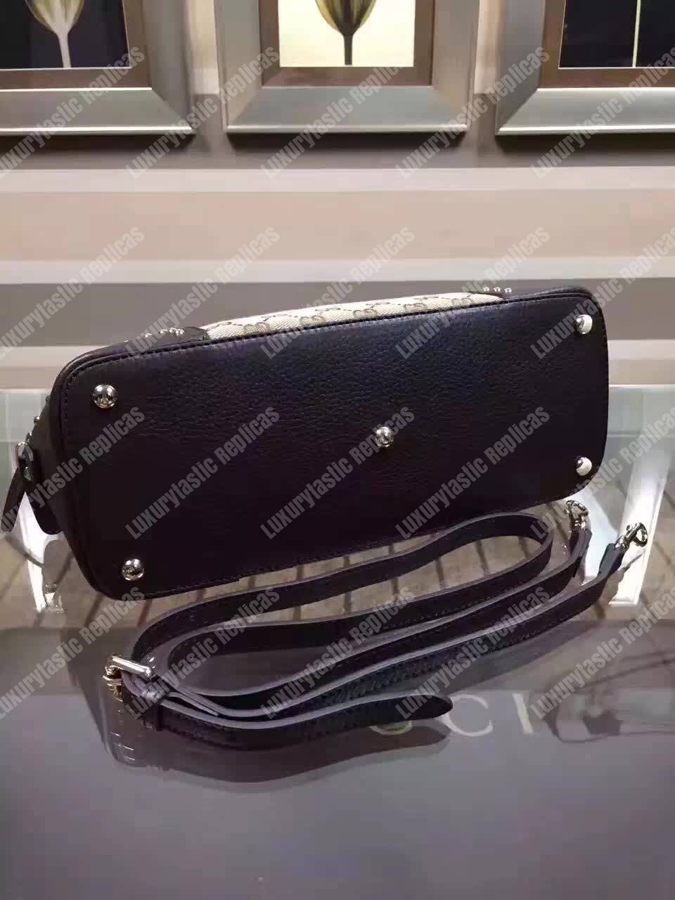 G*u*i gg canvas top handle bag black