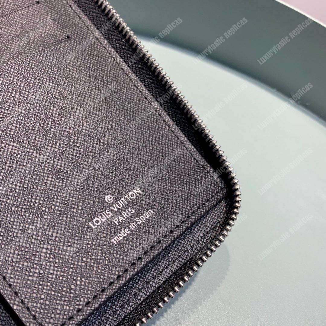 LV Zippy Wallet Vertical Taiga Leather Blue Trim