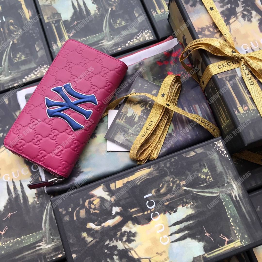 G*u*i fuchsia zip around wallet with ny yankees™ patch
