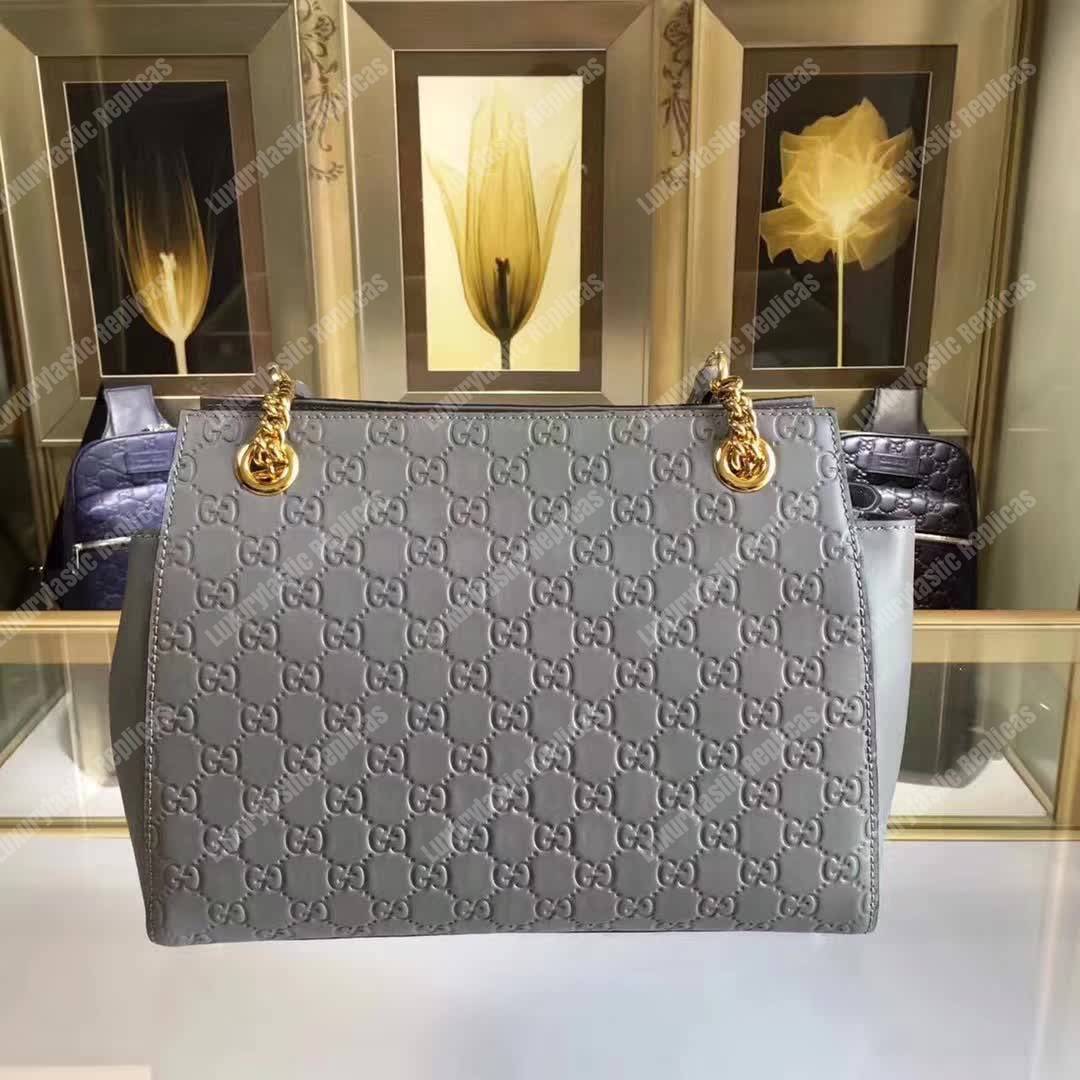 G*u*i signature medium top handle bag gray