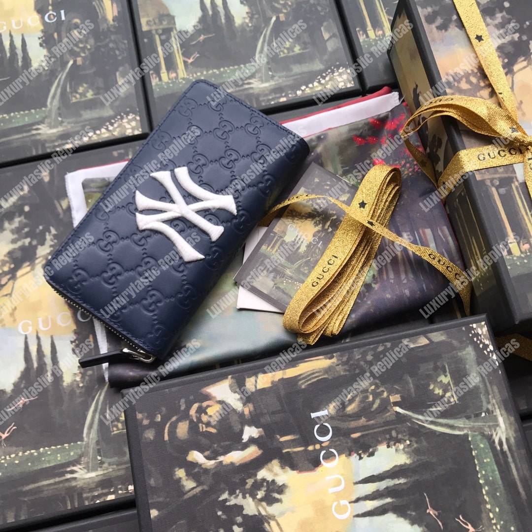 G*u*i blue zip around wallet with ny yankees™ patch