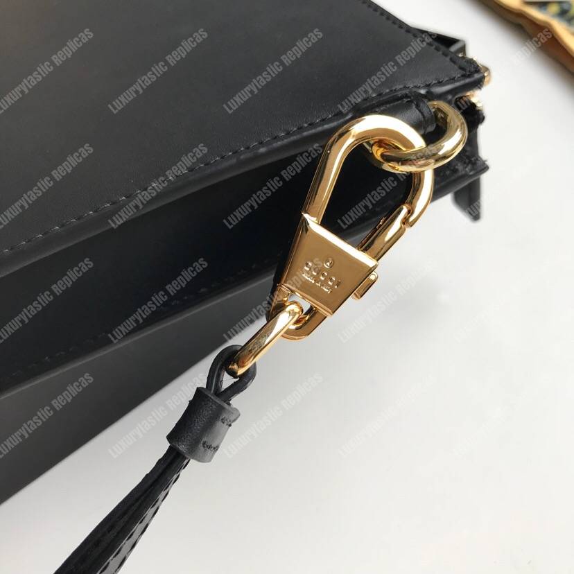 G*u*i leather pouch with G*u*i logo