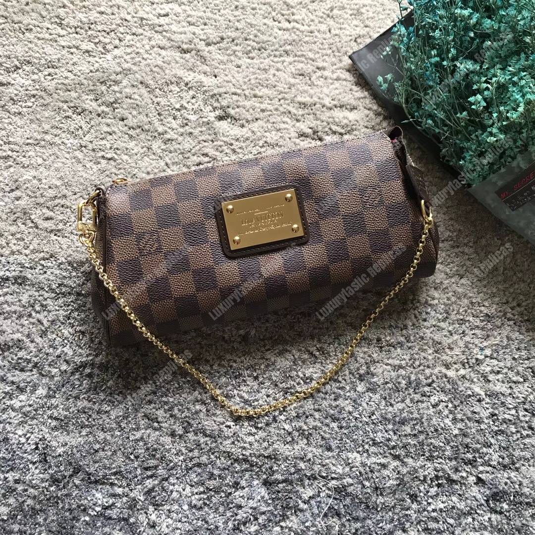 LV Eva Clutch Damier Ebene Canvas