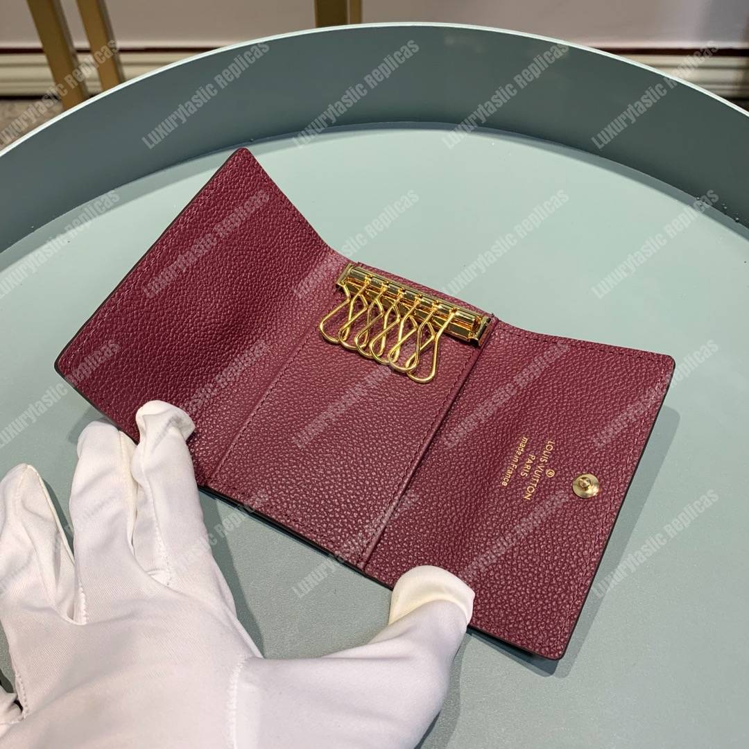 LV 6 KEY HOLDER Monogram Empreinte leather Aurore