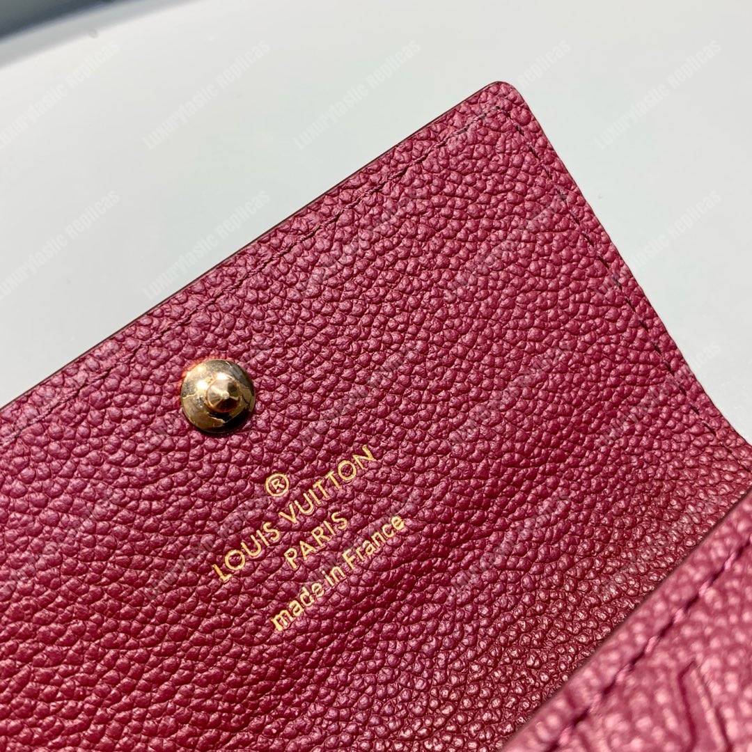 LV 6 KEY HOLDER Monogram Empreinte leather Aurore