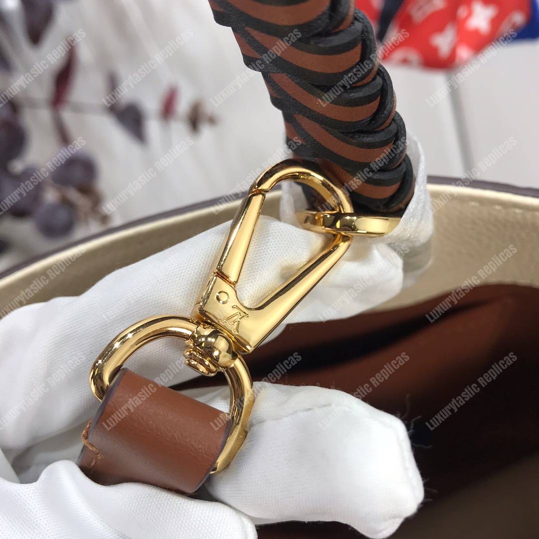 LV Montaigne MM Monogram Empreinte leather Creme