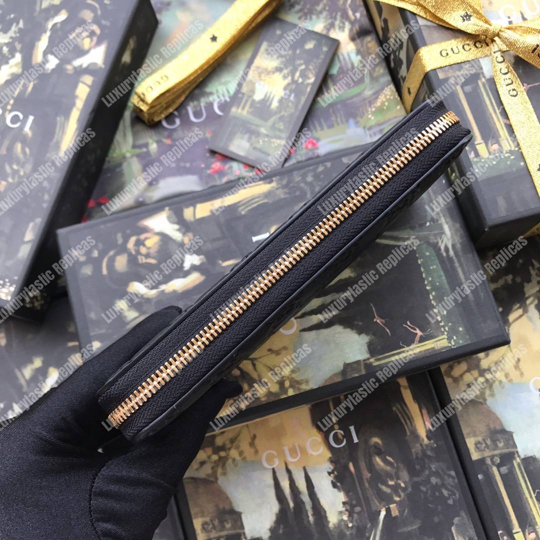 G*u*i signature zip around leather wallet black