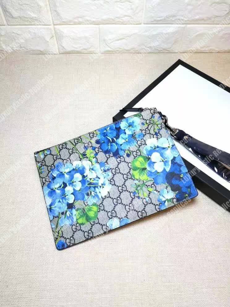 G*u*i blooms print gg sup*e clutch pouch