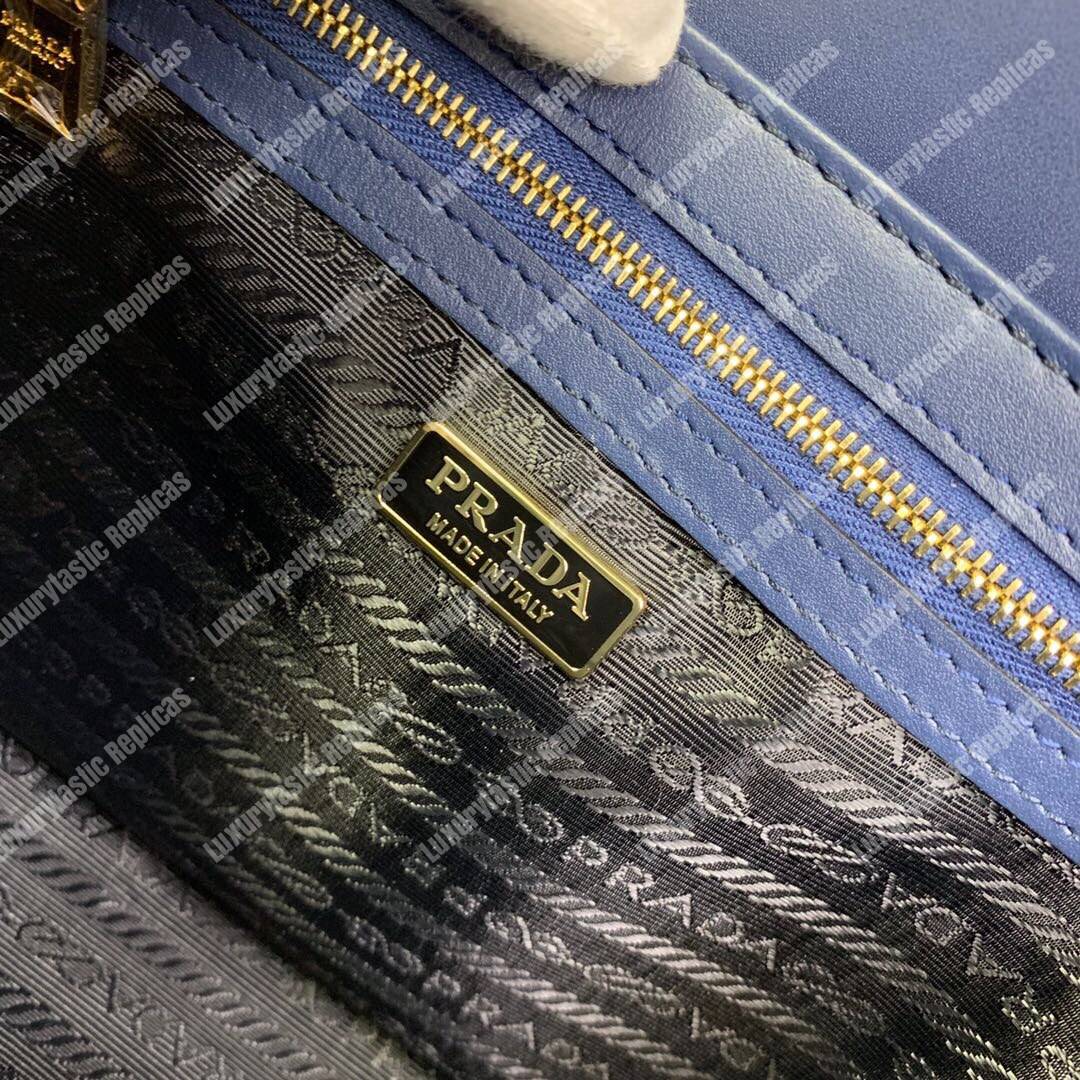 Pra*a emblème saffiano leather bag blue