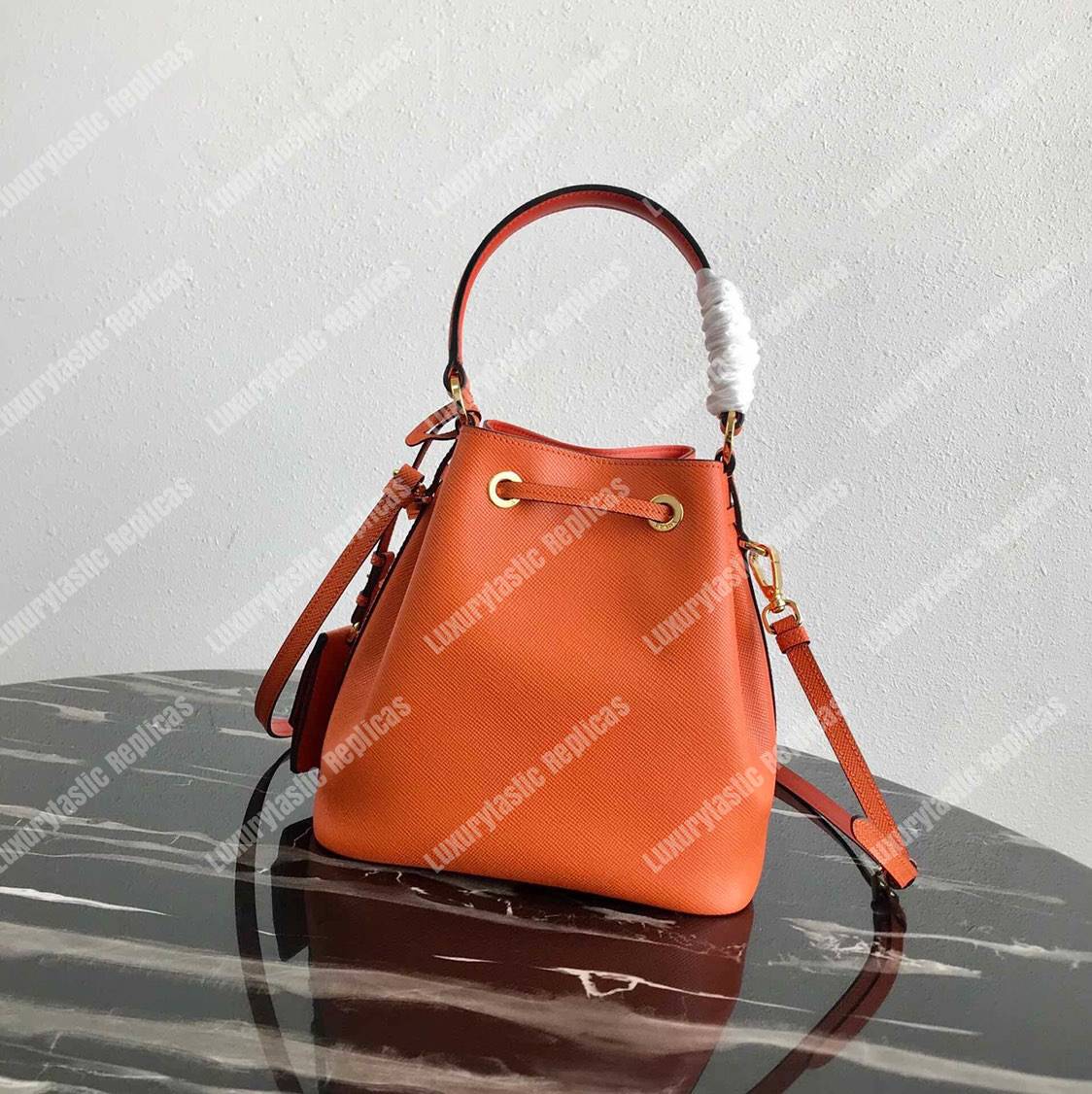 Pra*a saffiano leather bucket bag orange