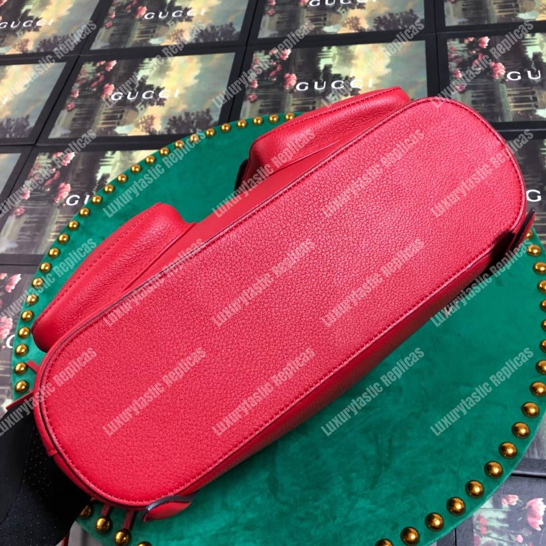 G*u*i leather bamboo tassel backpack hibiscus red