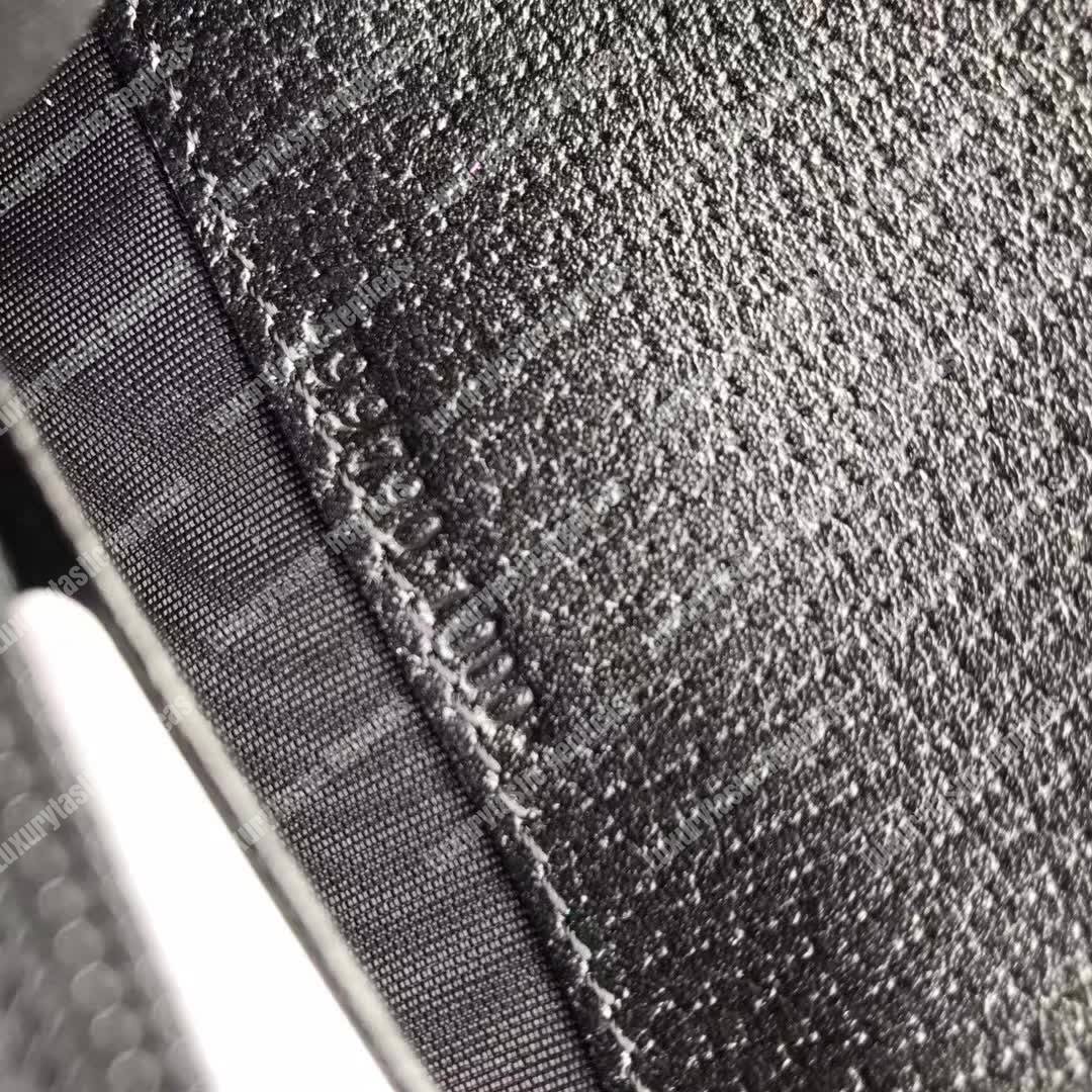 G*u*i leather continental wallet black